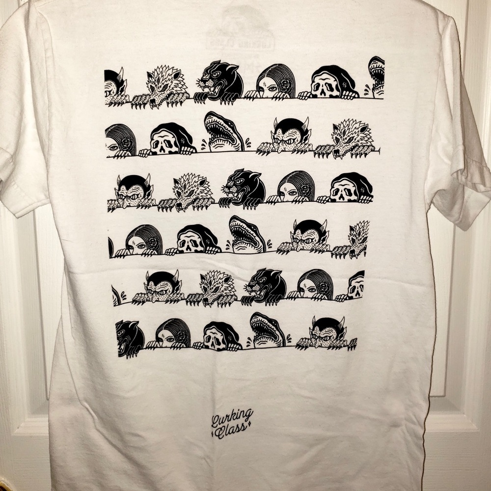 White “lurking class” skater tee.